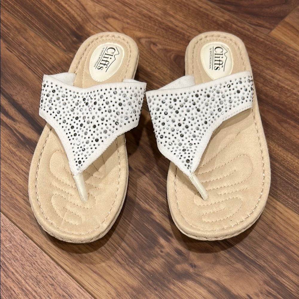 Cliffs by WHITE MOUNTAIN White and Tan Sandals with Lacy Pattern and Thong Style